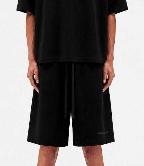 ANCIENT YET PRESENT BAGGY BLACK SHORTS